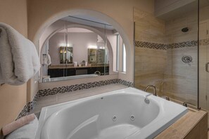 Bathtub, jetted tub, hair dryer, towels
