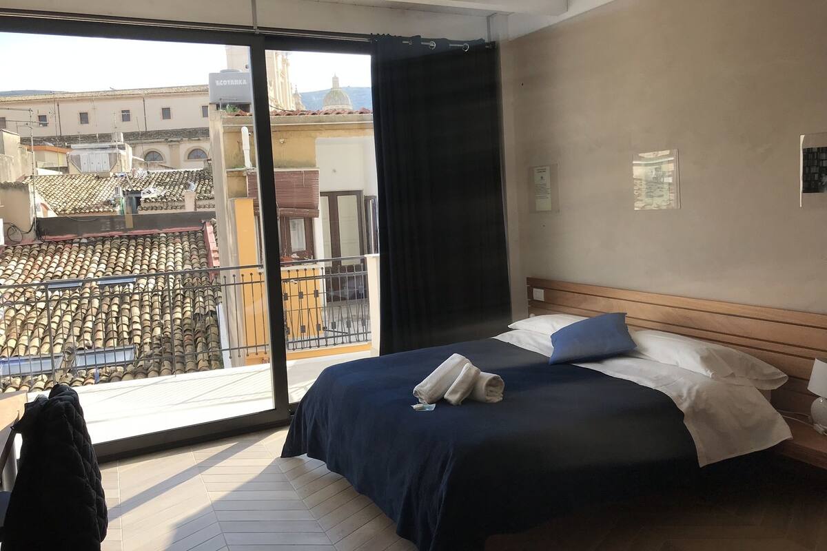 Premium bedding, memory-foam beds, in-room safe, individually decorated
