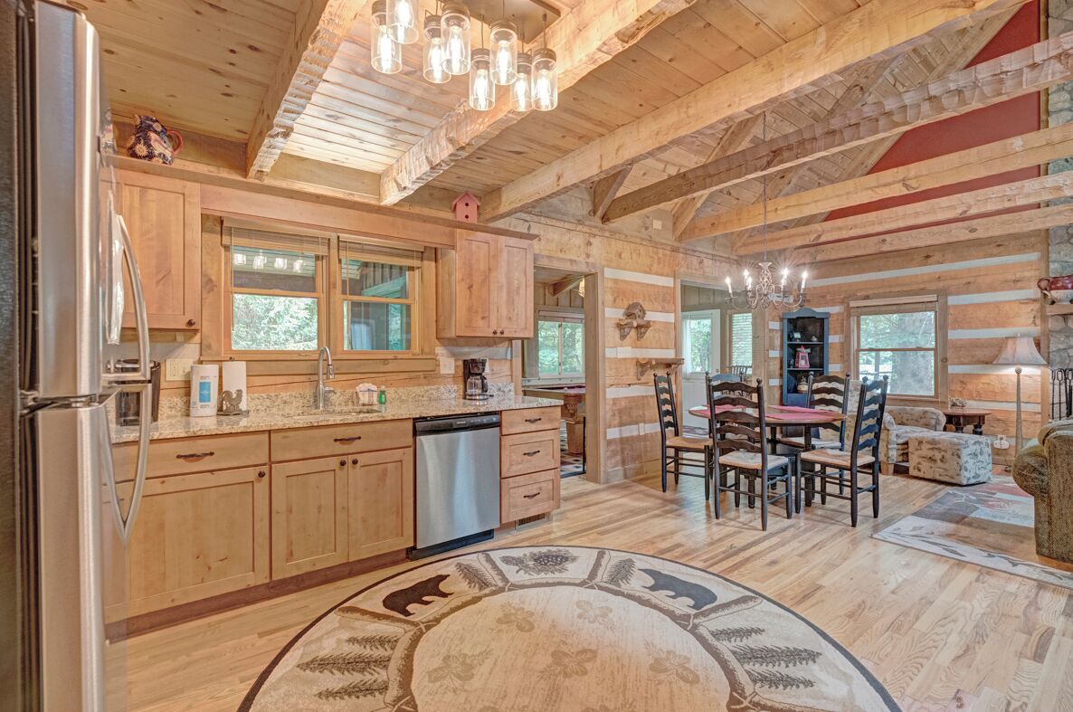 Dishwasher, coffee/tea maker, cookware/dishes/utensils, dining tables