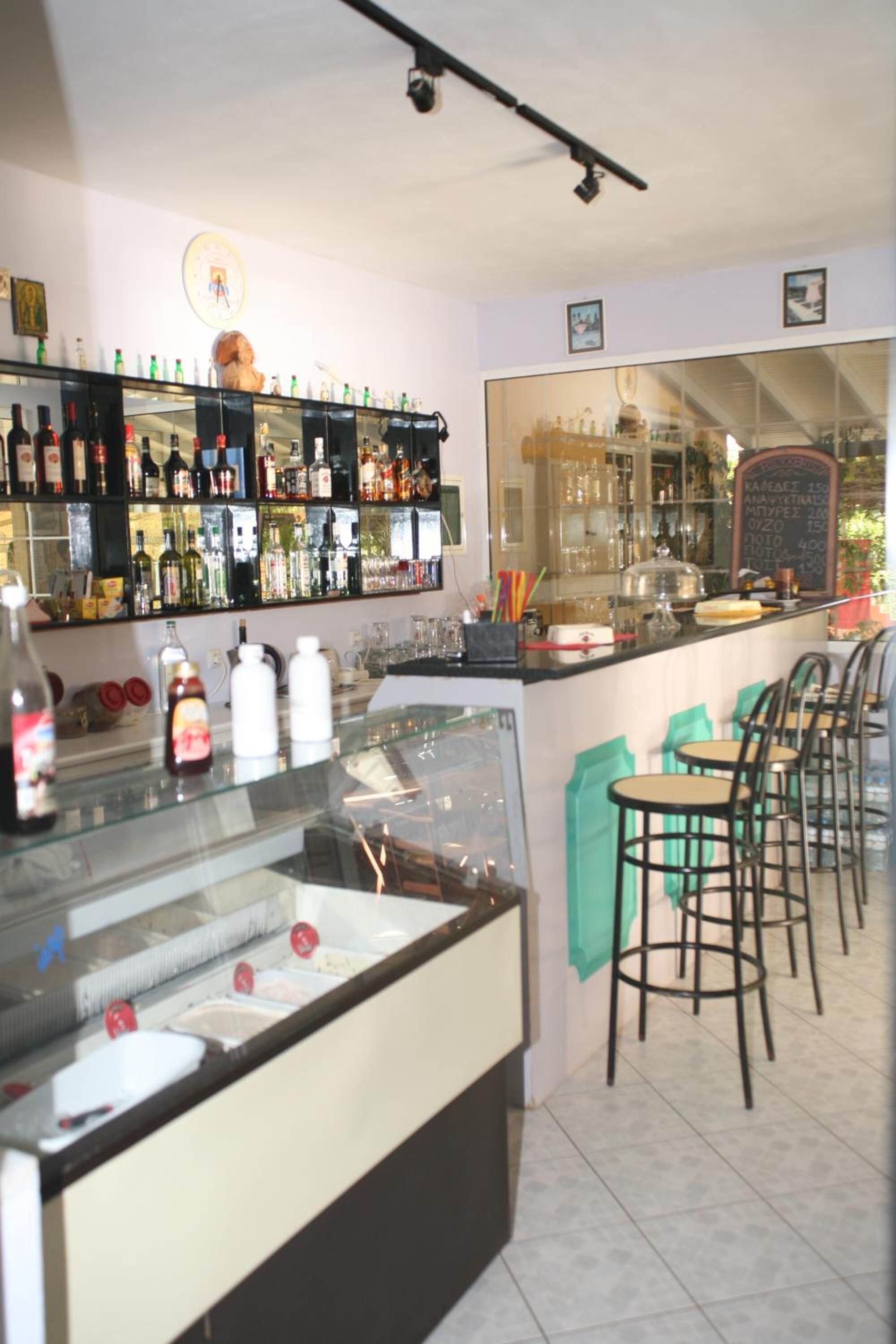 Seasonal outdoor pool, open 8:00 AM to 8:00 PM, pool umbrellas