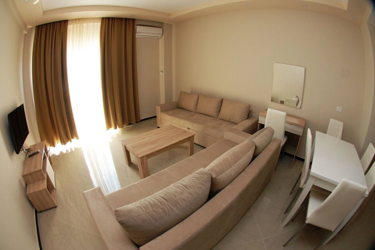 Appartement, 1 chambre | Coin séjour | Télévision à écran plat