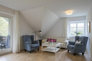 Apartamento standard, banheiro privativo | Lounge