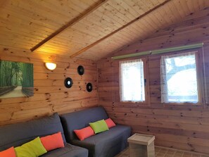 Luxury Chalet, 1 Bedroom, Non Smoking, Sea View | Living area