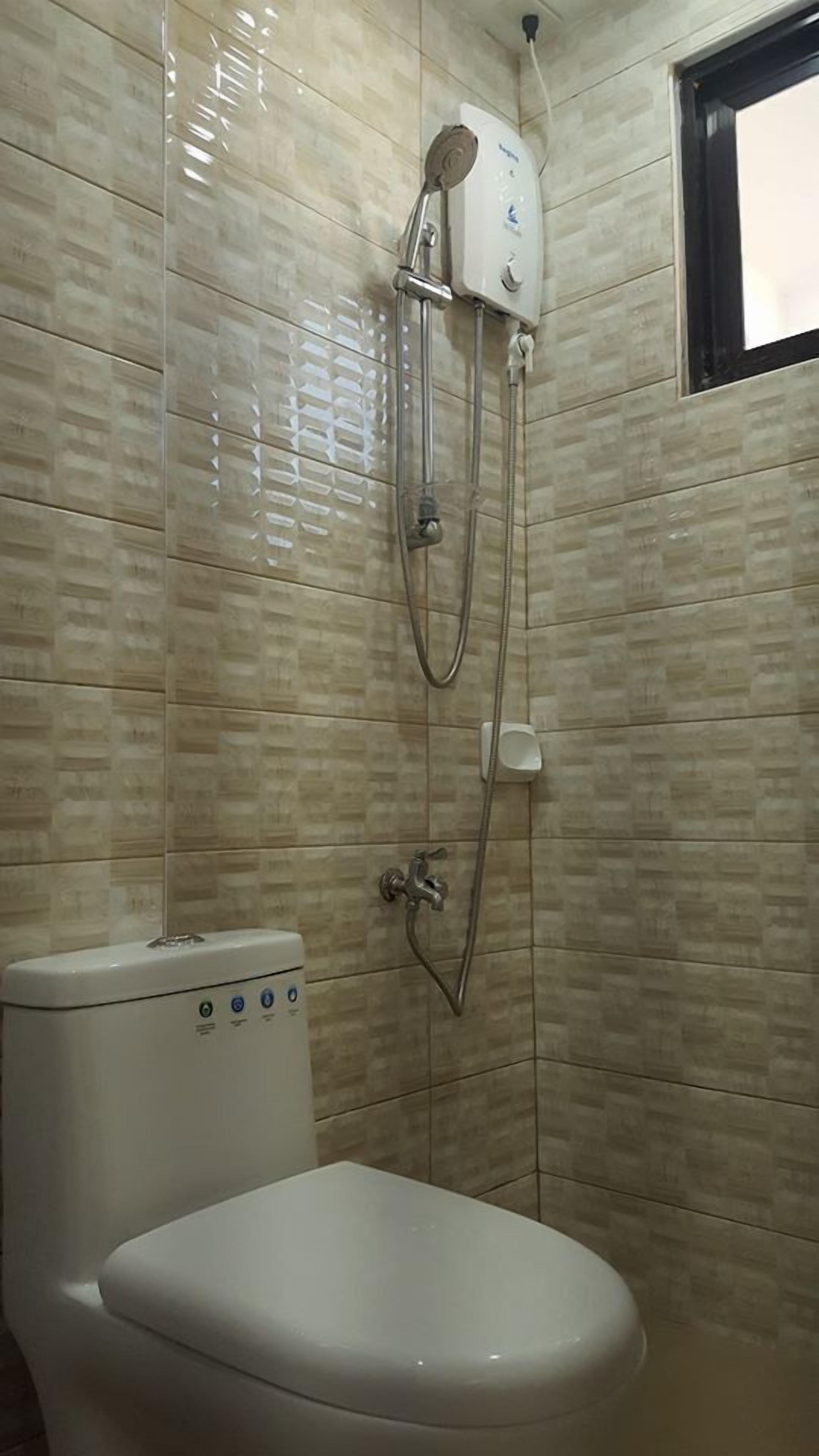 Shower, free toiletries, hair dryer, slippers