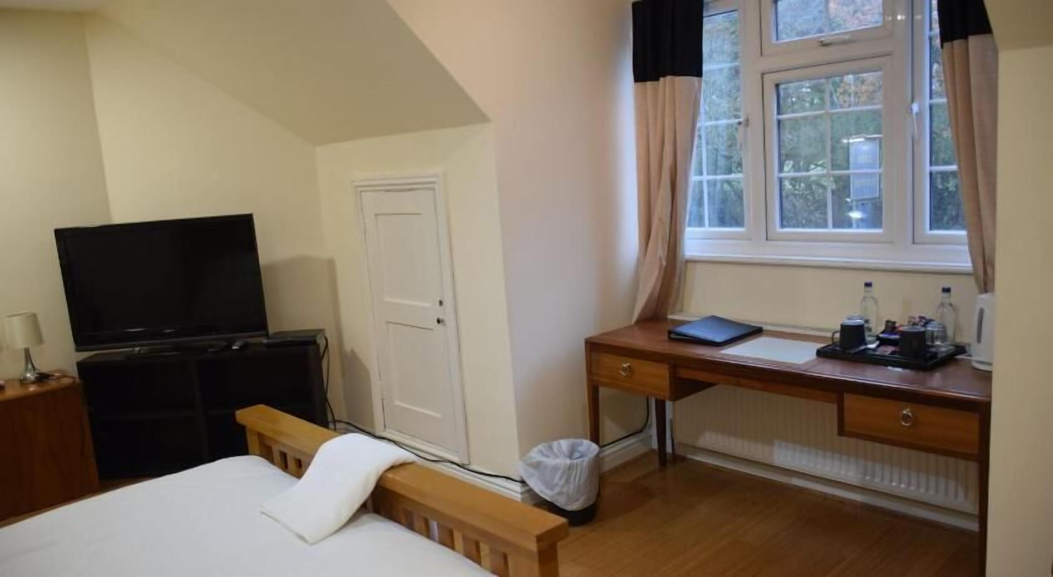 Desk, blackout drapes, iron/ironing board, free WiFi