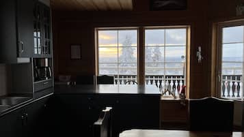 Deluxe Chalet | Private kitchen | Fridge, microwave, oven, stovetop