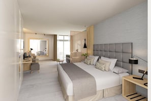 Una habitació d'hotel moderna amb un llit gran, una taula de treball i una zona de seients.