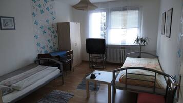 Deluxe Apartment, Balcony | 4 bedrooms, desk, blackout curtains, free WiFi