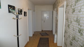 Deluxe Apartment, Balcony | Living area | Flat-screen TV