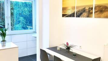 Apartment | Living area | 80-cm flat-screen TV with cable channels, TV