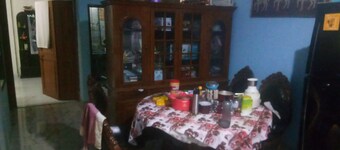 semi furnished Flat For Rent with one queen size bed and 4 chairs dining table