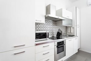 Apartment, 1 Bedroom | Private kitchen | Fridge, microwave, oven, stovetop