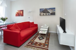 Apartment, 1 Bedroom | Living area | Flat-screen TV