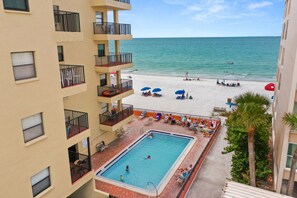A heated pool - 🌅 Las Brisas #305 — Updated 3BR Gulf Front Condo with Balcony & Room for 10 (Madeira Beach)