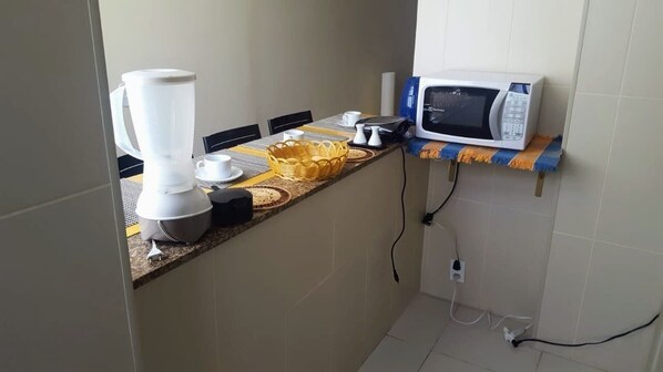 Fridge, microwave, stovetop, cookware/dishes/utensils