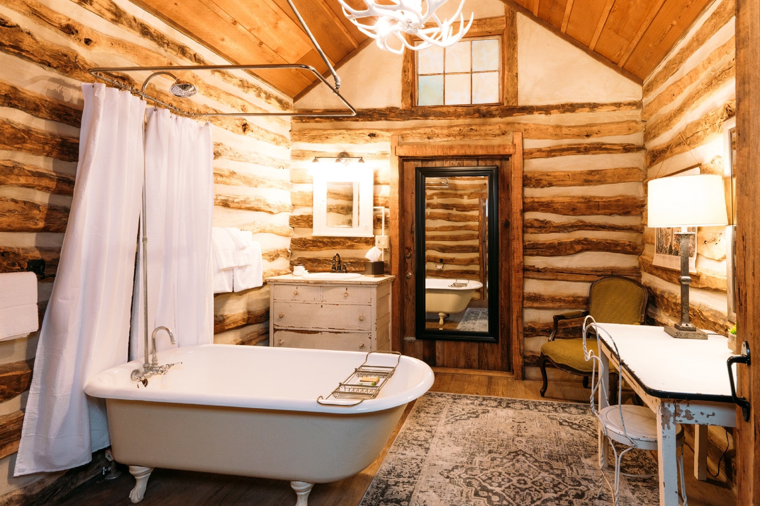 enchanted cabin | bathroom | designer toiletries, hair dryer, bathrobes, towels