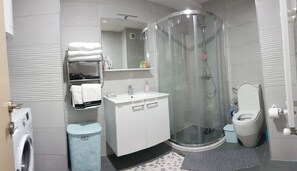 Hair dryer, towels, soap, shampoo