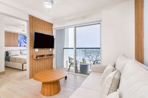 Luxury Apartment | Living area | Flat-screen TV