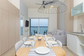 Luxury Apartment | Living area | Flat-screen TV