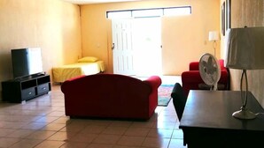 Chambre Deluxe | Coin séjour