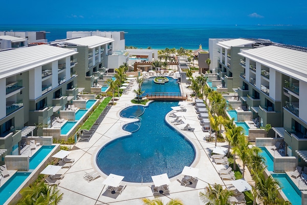 2 outdoor pools, open 8:00 AM to 8:00 PM, pool umbrellas, sun loungers