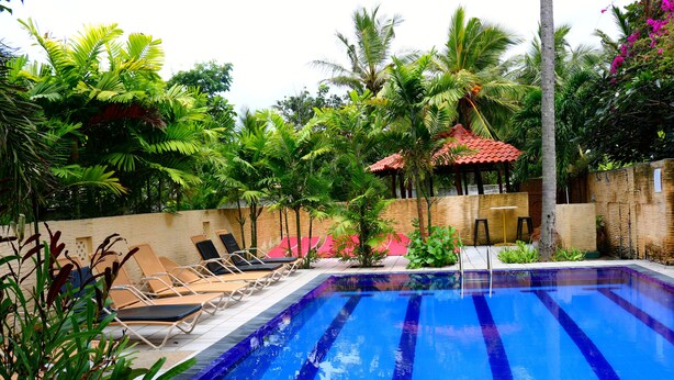 Unclassified image, 1 of 21, button - maple Leaf Village (Negombo)