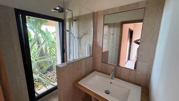 Bathtub, hair dryer, towels, soap