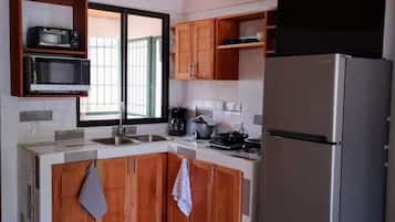 Fridge, microwave, coffee/tea maker, toaster
