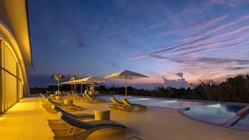 Outdoor pool, open 7:30 AM to 8:00 PM, pool umbrellas, pool loungers