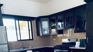 Superior Villa, 3 Bedrooms | Private kitchen - Paradise en Puerto Plata (Puerto Plata)