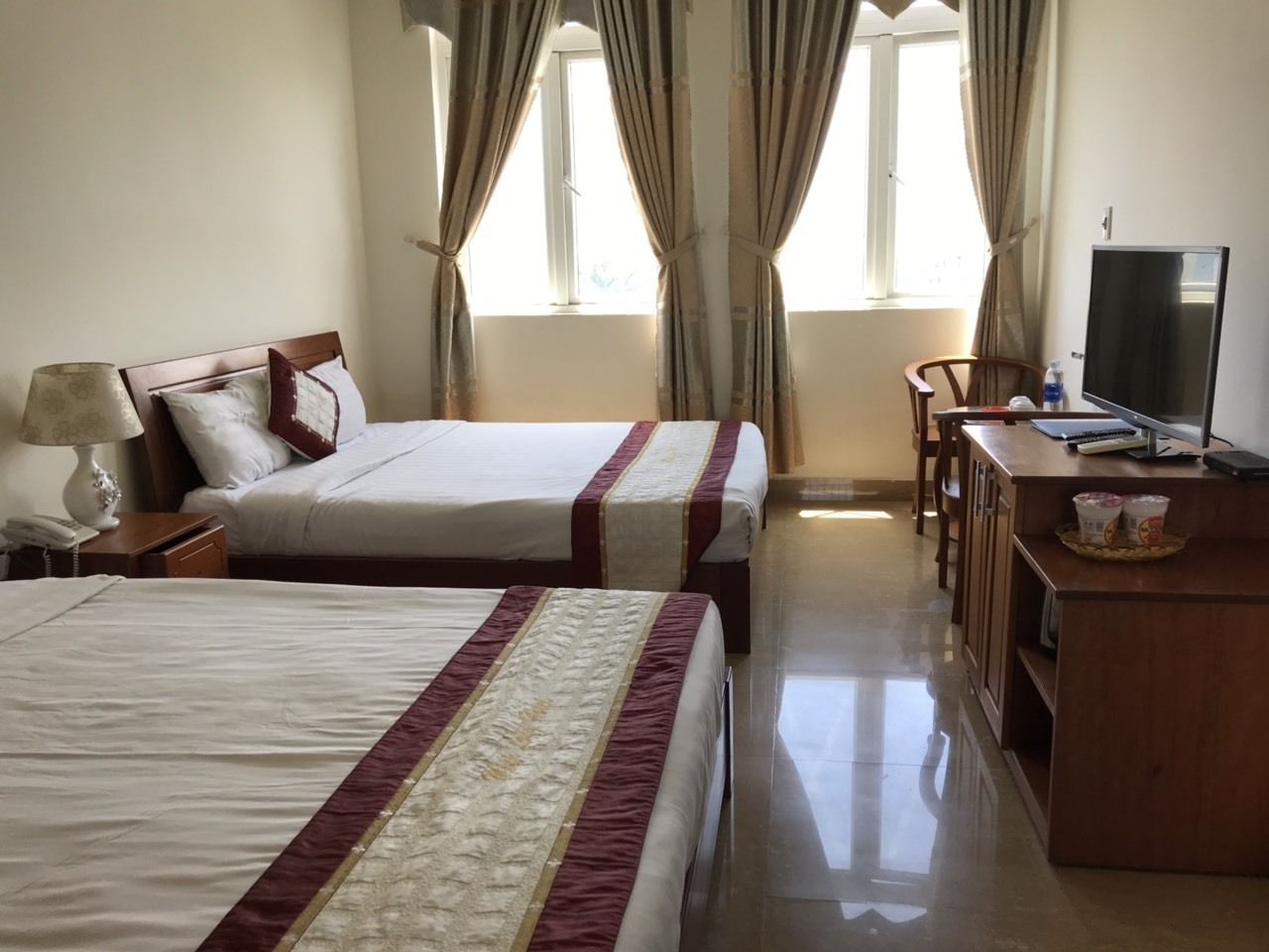 basic double room | premium bedding, memory-foam beds, desk, laptop workspace