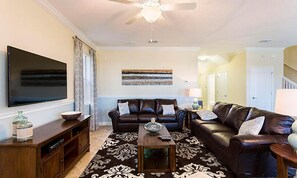 Una televisión, un futbolín