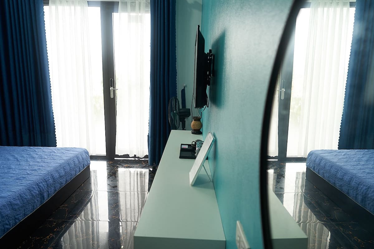 1 habitación, escritorio, cortinas blackout y sistema de insonorización