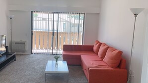 City Apartment, 1 Bedroom | Living area - Charming Mid-Century Stay near Disney (Fullerton)