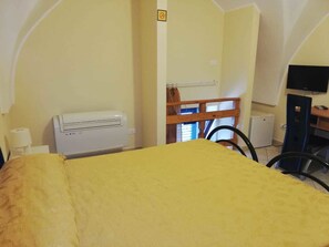 Down duvets, desk, iron/ironing board, cots/infant beds