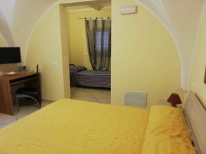 Down duvets, desk, iron/ironing board, cots/infant beds