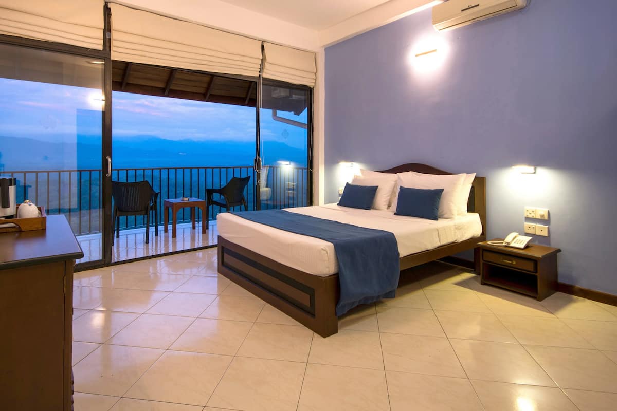 Deluxe Double Room with Balcony | Premium bedding, memory foam beds, desk, blackout drapes