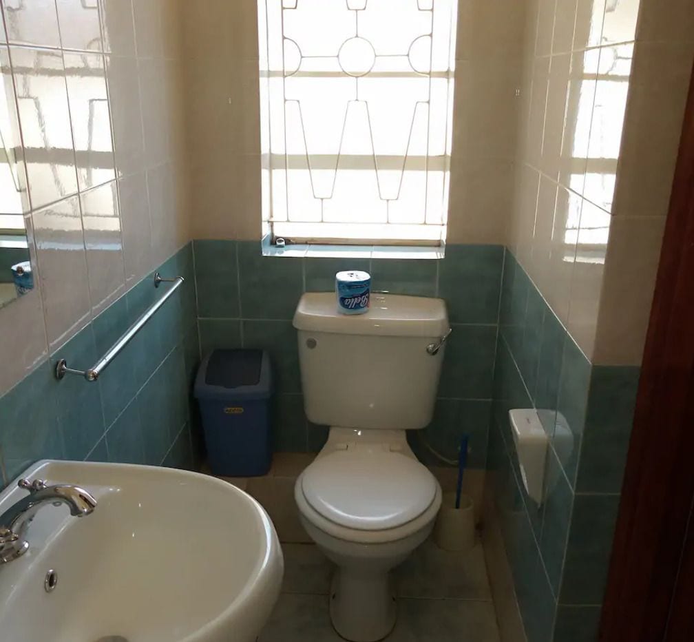 Economy Room | Bathroom | Shower, towels, soap, toilet paper