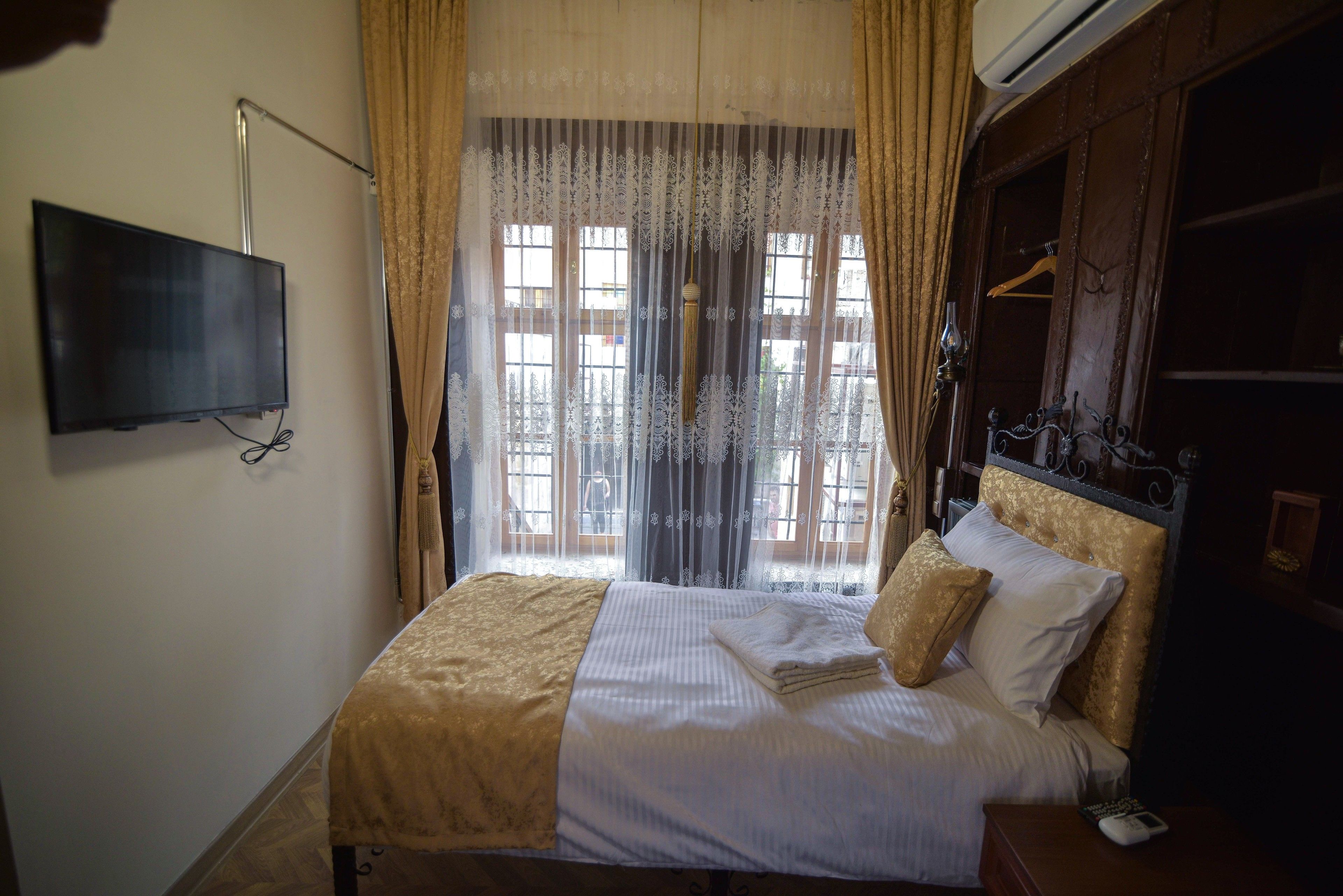 double room (sehitkamil) | minibar, desk, laptop workspace, iron/ironing board