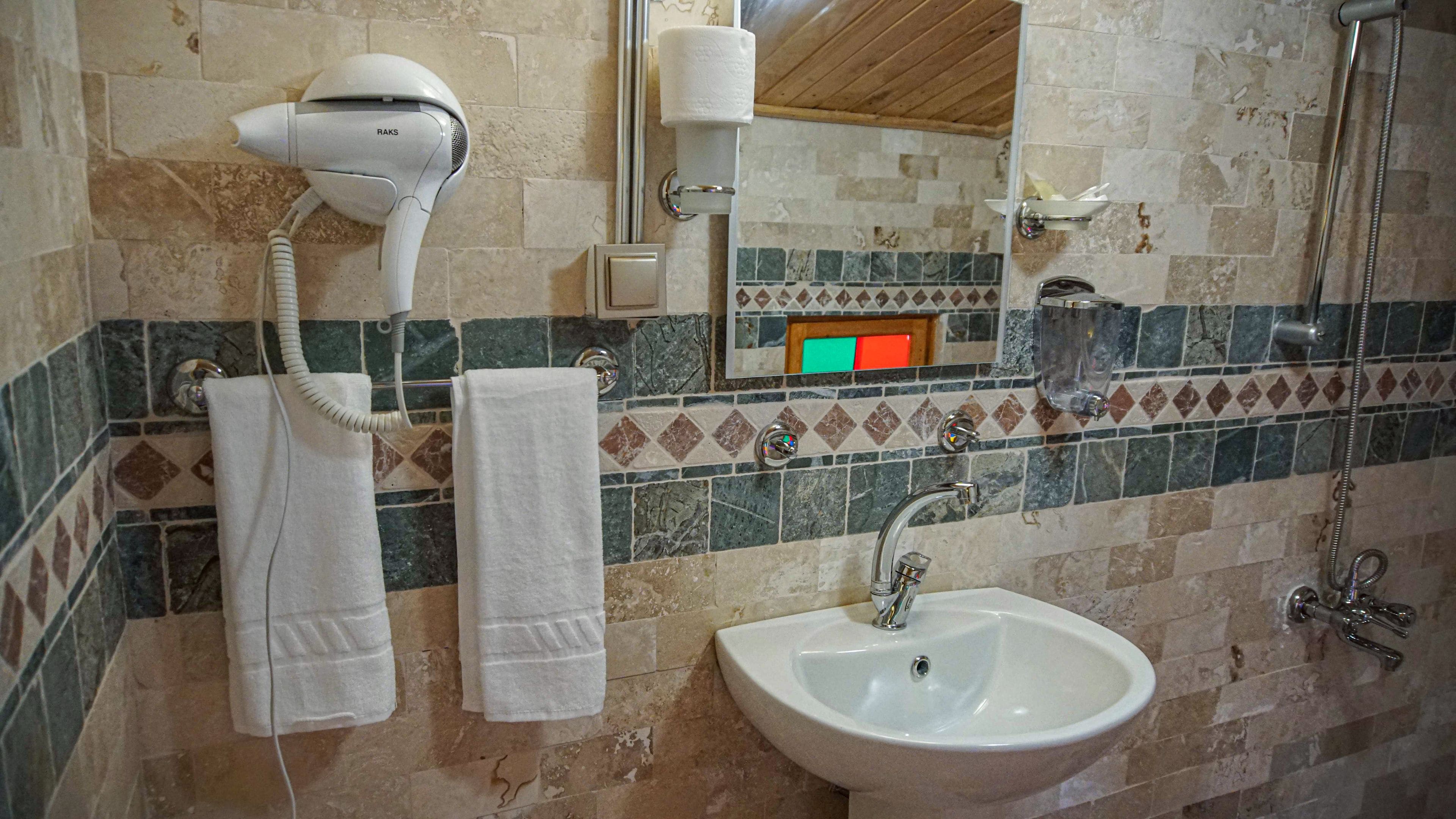 honeymoon room | bathroom | shower, rainfall showerhead, free toiletries, hair dryer