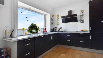 Villa | Private kitchen | Fridge, microwave, oven, stovetop