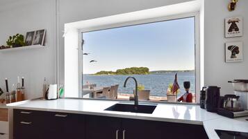 Villa | Private kitchen | Fridge, microwave, oven, stovetop