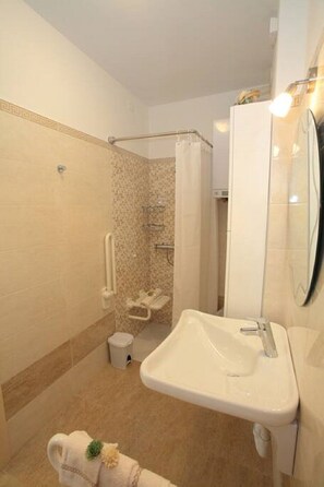 Hair dryer, towels, soap, toilet paper