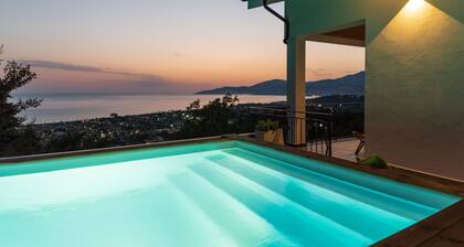 Refined villa with minimal chic interior and fabulous private pool with sea view