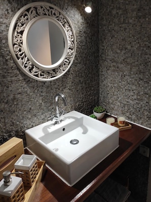 Shower, hair dryer, towels, toilet paper