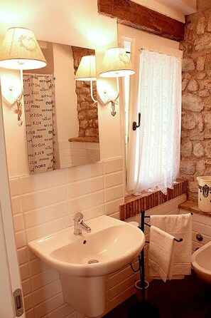 Hair dryer, towels, soap, toilet paper