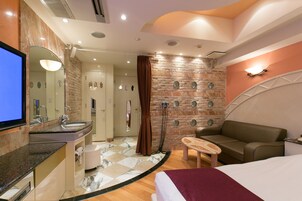 Down comforters, minibar, in-room safe, individually decorated