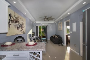 Luxury Apartment | Living area | 65-inch Smart TV with cable channels, TV - Barri Vacation Home (Kingston)