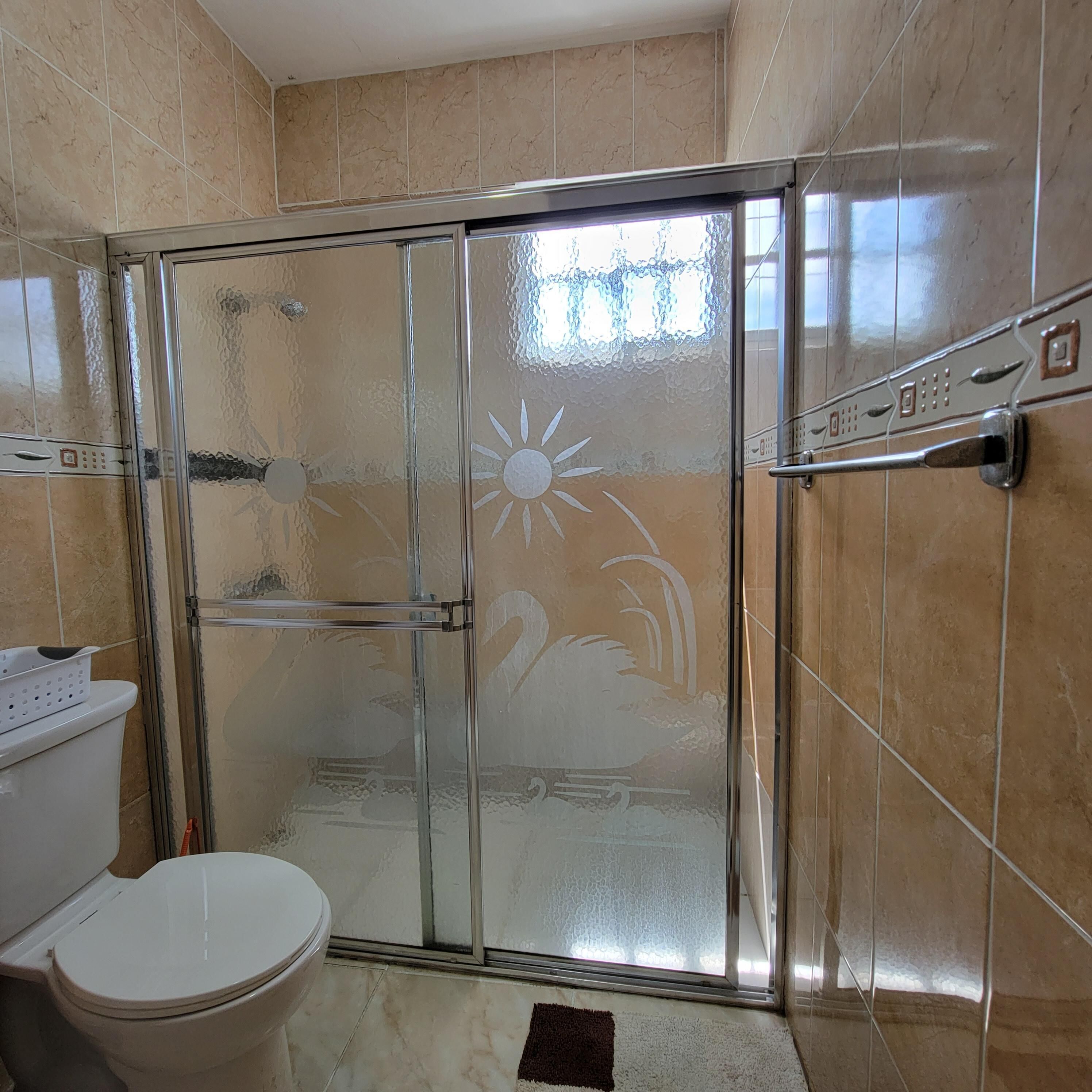 Standard Room | Bathroom | Rainfall showerhead, free toiletries, towels, soap