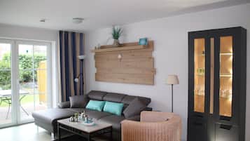 Télévision LED, lecteur de DVD, livres, médiathÚque